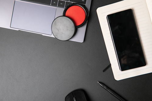 印泥手机办公用品商务摄影图 展现专业与高效的视觉叙事